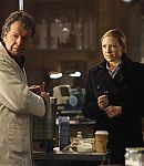 2x16-olivia-in-the-lab-with-a-revolver-001.jpg